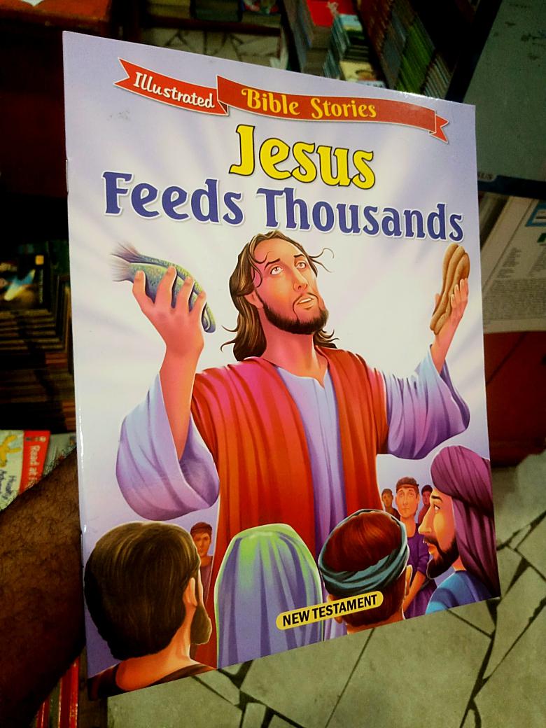 Cover of Jesus feeds thousands 